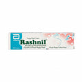 A box of Abbott Rashnil Nappy Rash Cream, 50 grams, featuring a white and teal design with pink and blue decorative swirls on a white background.