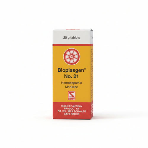A box of Bioplasgen No. 21 Homoeopathic Medicine by Schawen, featuring a yellow and red design with a white top section, photographed on a light gray surface.